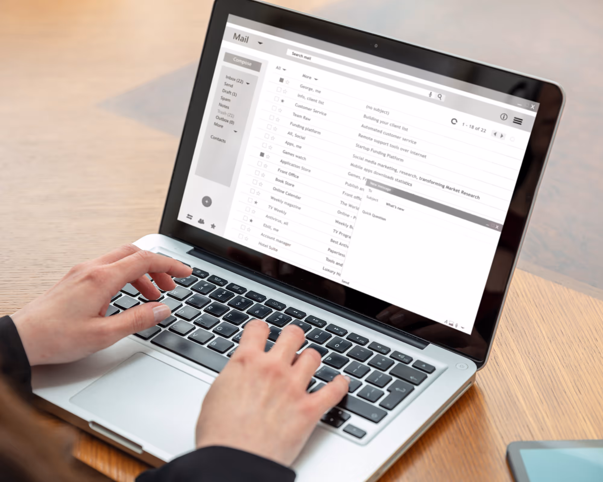 Woman on her computer checking her email.