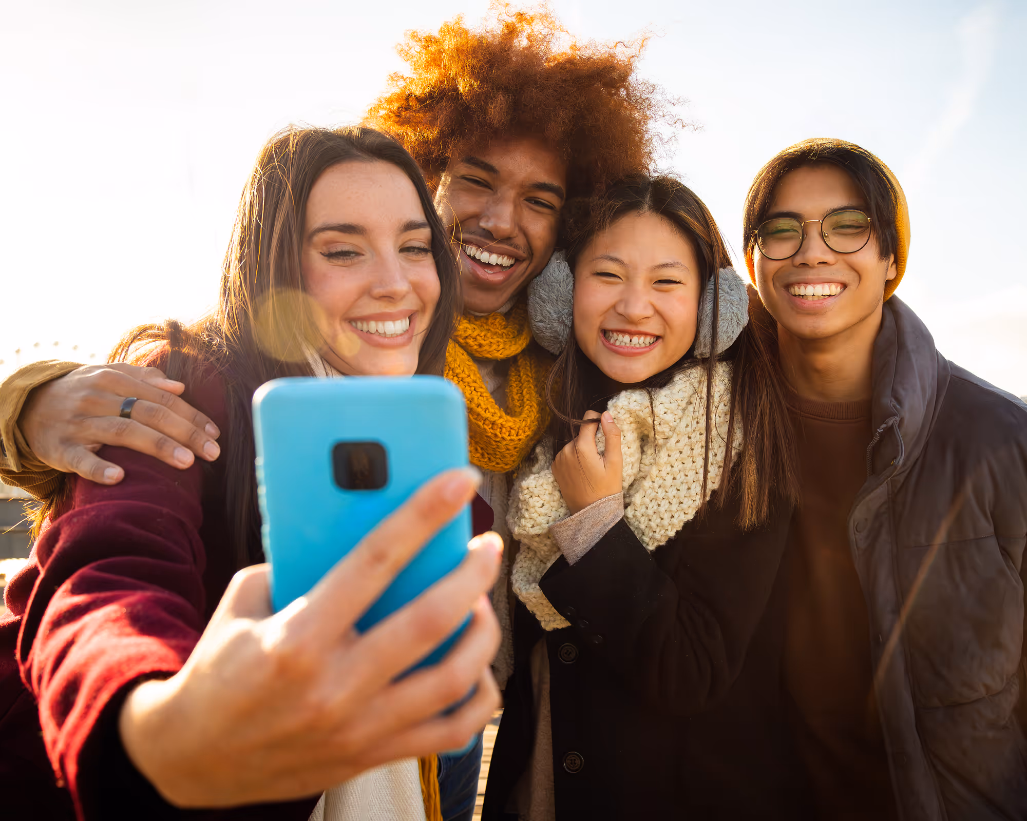 Image of friends taking a selfie for social media.