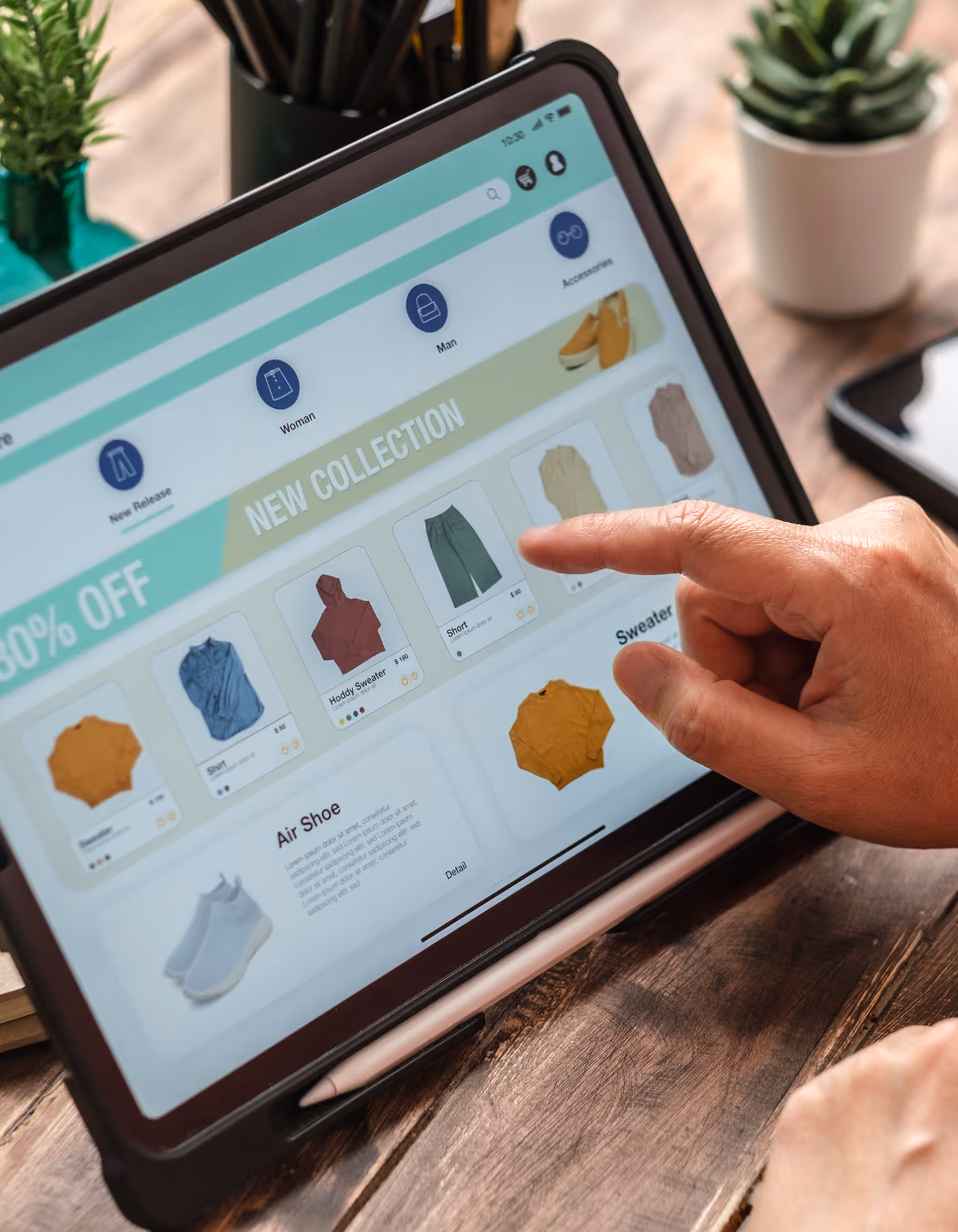 Image of a woman shopping on her tablet