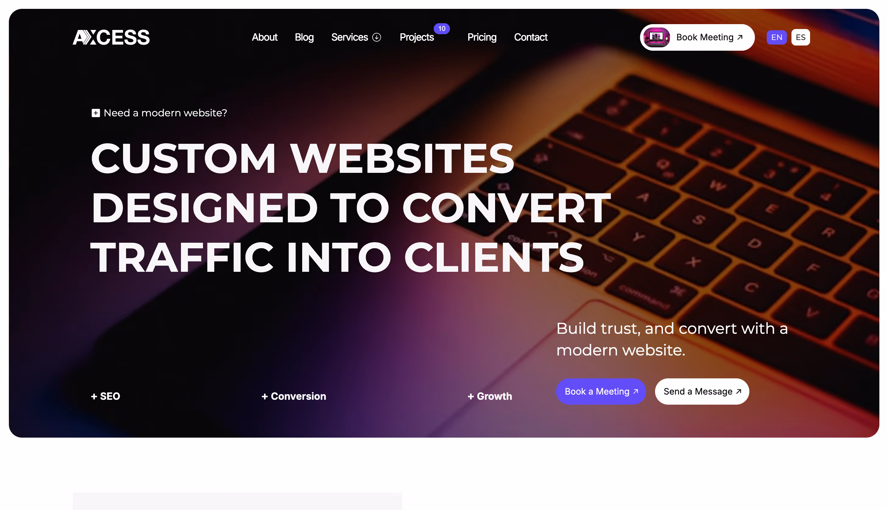 Website header showing custom web design services with a keyboard background and call-to-action buttons.