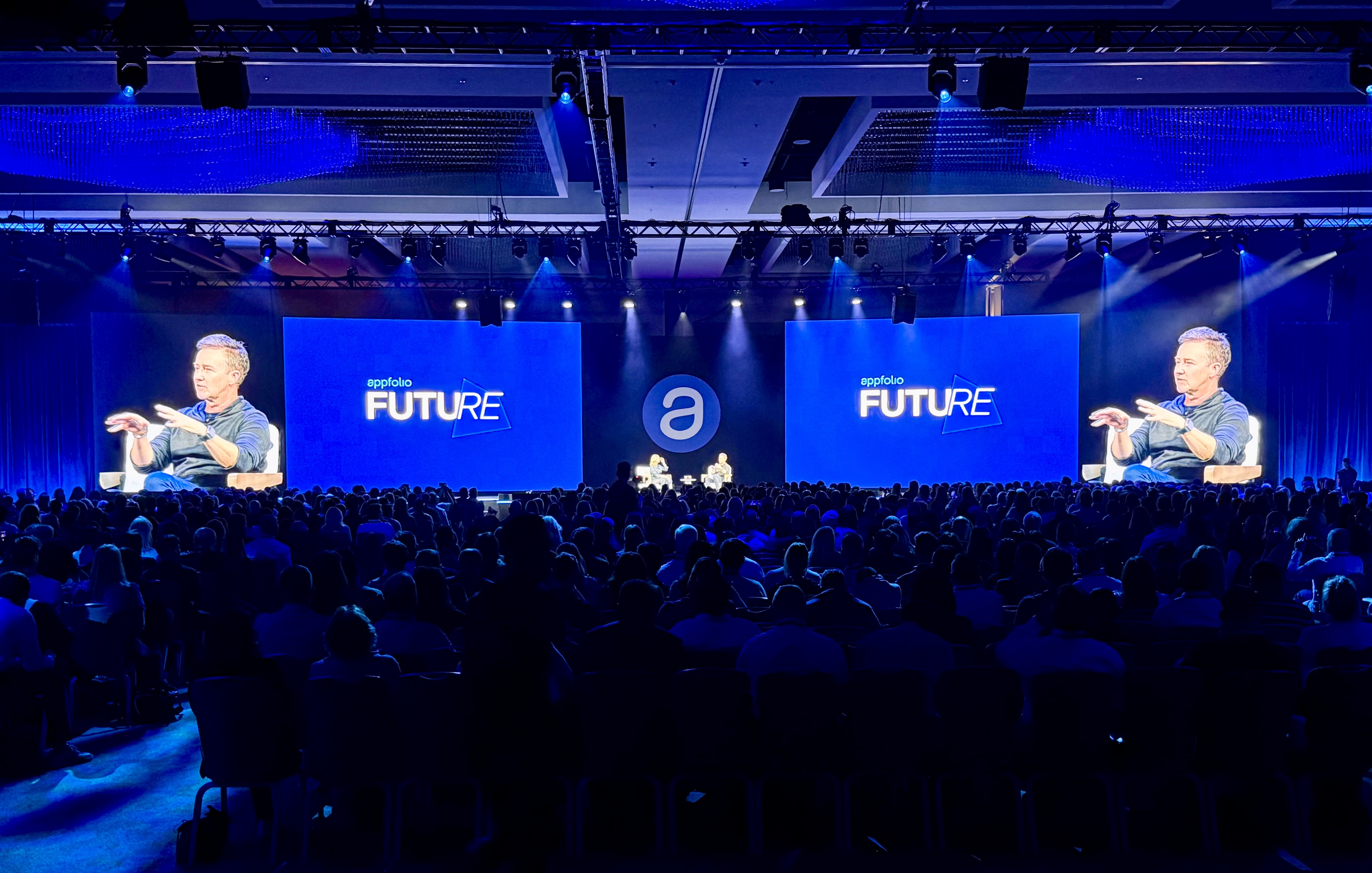 Picture of an LED screen background at a conference event