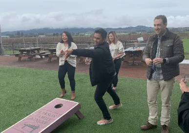 menlo security employees playing cornhole