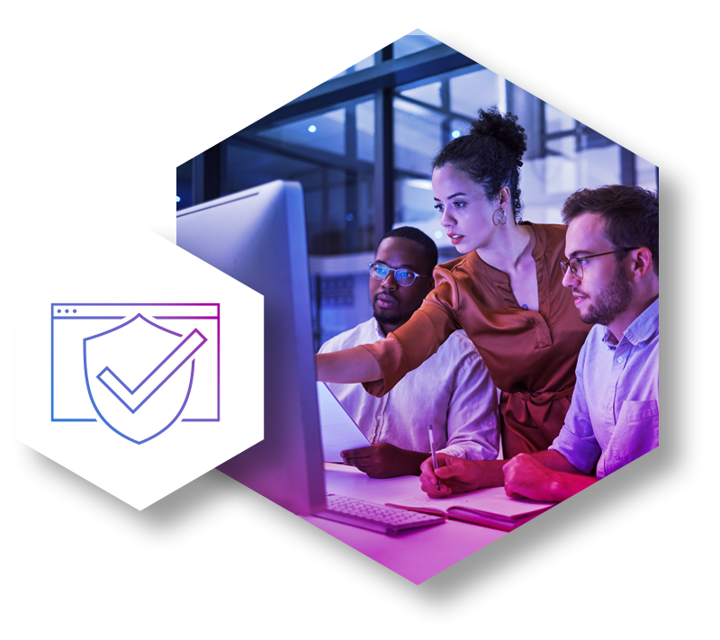 Three IT specialists intensely looking at a computer screen