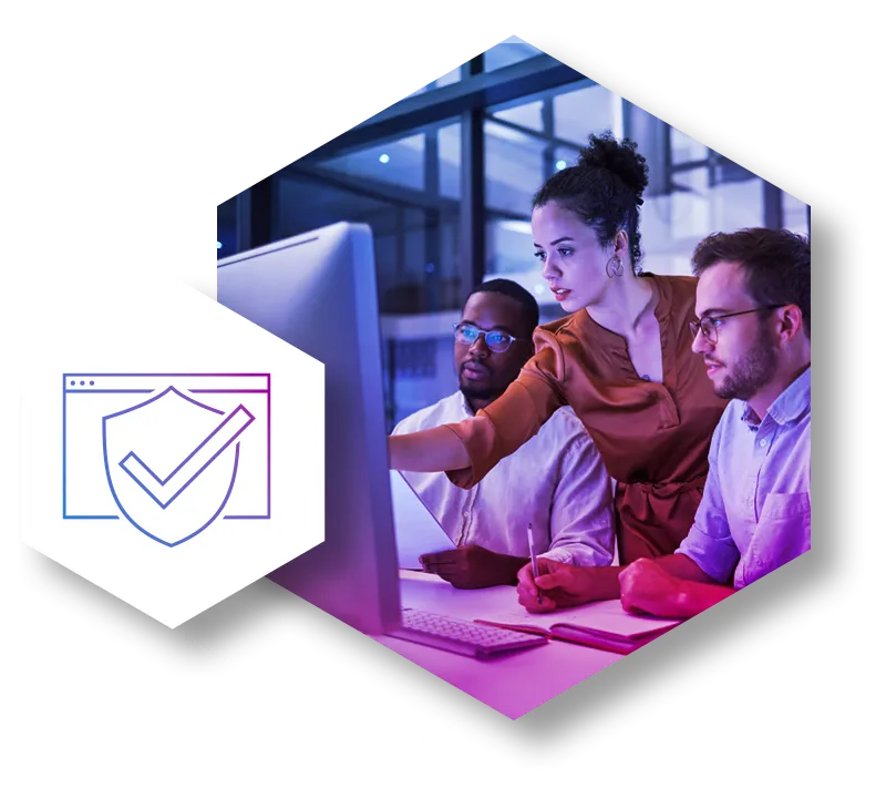 Three IT specialists intensely looking at a computer screen