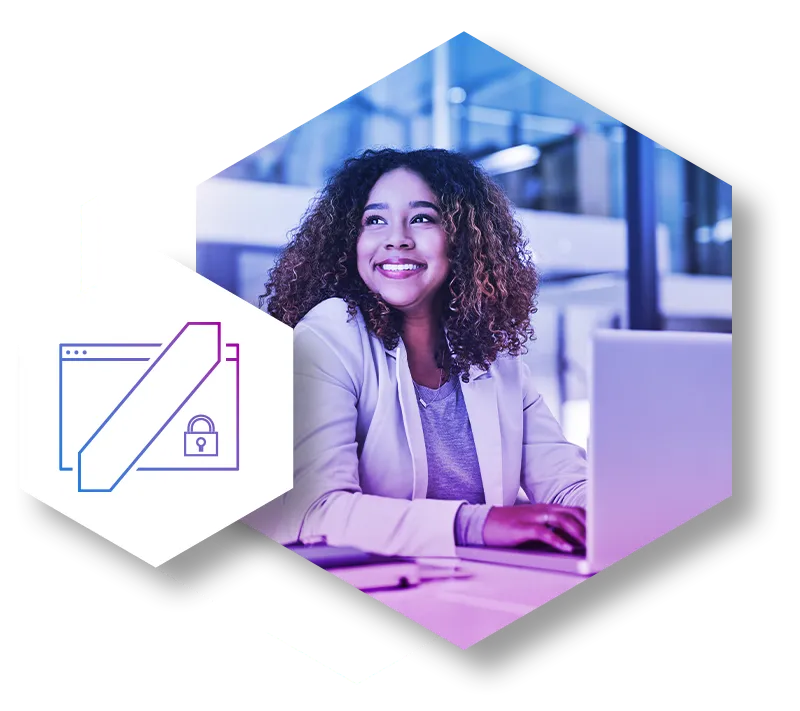 Young businesswoman working on a laptop in an office.