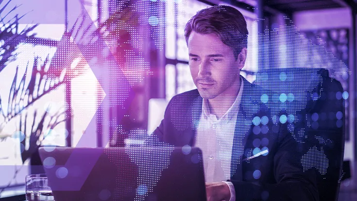 businessman in suit at workplace working with laptop  with global map