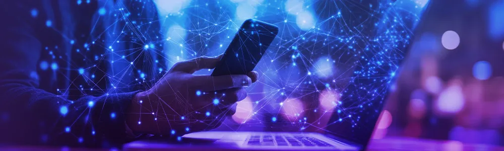 Businessman using mobile phone and laptop computer with global internet network connection technology,