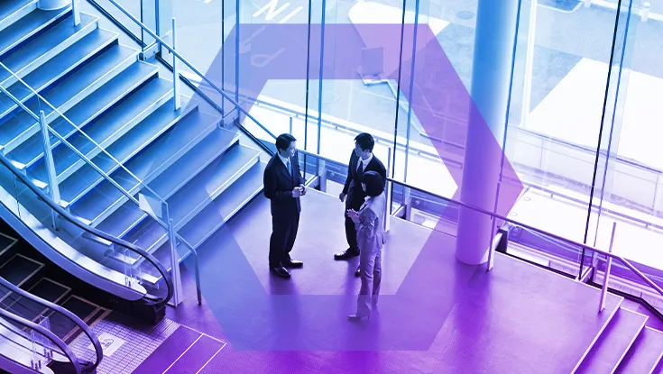 Group of people in lobby talking