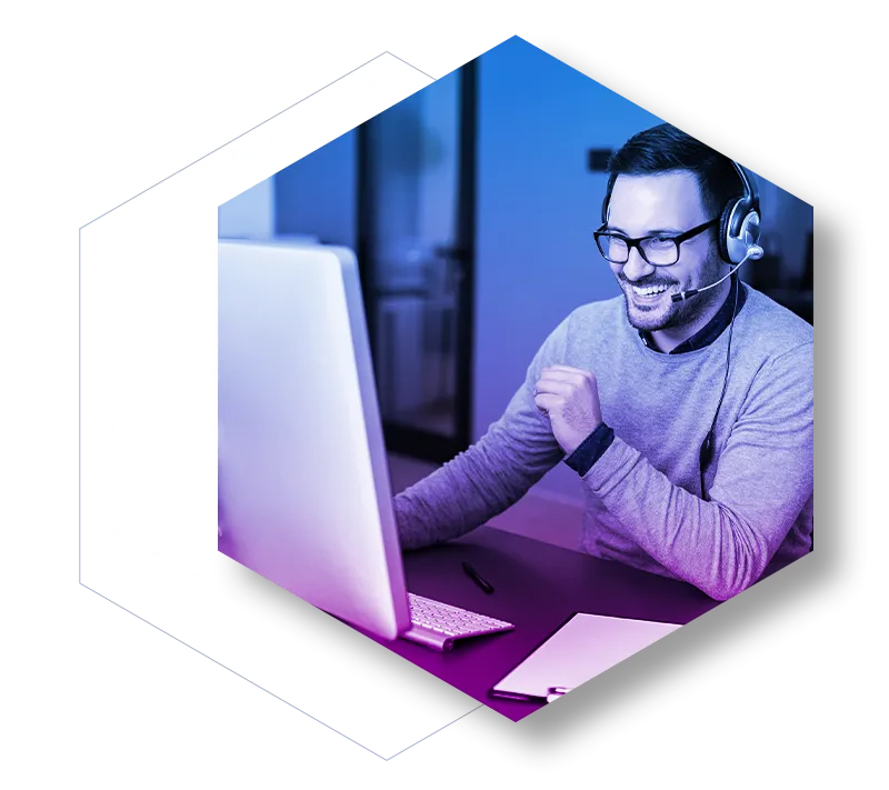 customer support manager with headset working on computer