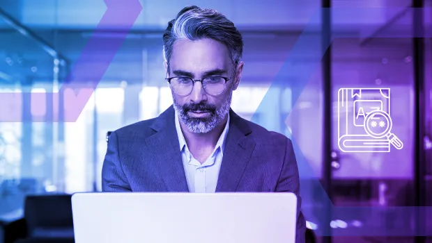 An IT professional uses a laptop to manage data security policies. The holographic icons symbolize the two key capabilities of Menlo DLP: browser-centric and dictionary-based Data Loss Prevention.