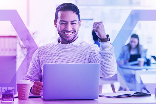 Wmployee celebrates a success at his laptop, symbolizing a secure work environment where intellectual property (IP) is safe. The image represents how Menlo DLP prevents accidental or malicious data exfiltration from insider risks