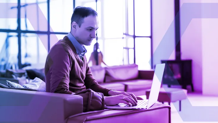 A security professional works on a laptop, representing the ability to gain immediate insights into a security incident. The image symbolizes how response teams can view browser session recordings in near-real time to diagnose and resolve threats quickly.