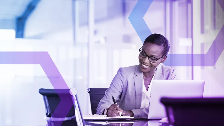 A smiling professional enjoys a seamless user experience on her laptop, representing the benefits of Simplified Access & Experience. This image symbolizes how a modern, browser-based solution eliminates the latency and frustrating lag of traditional VDI.