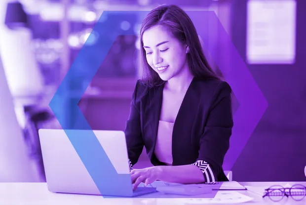 A smiling professional works on her laptop, representing how an 'Agentless' security solution 'Works for Everyone'. This symbolizes a secure, non-invasive approach that requires no endpoint software to maintain, covering all user types like BYOD and contractors