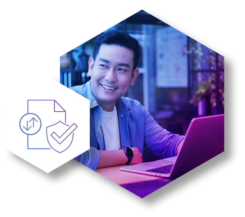 A happy employee works on a laptop, with a secure document icon in the foreground representing definitive proof of compliance. This visual illustrates how a modern security solution provides visibility and control over sensitive data and file-borne threats, eliminating the guesswork of legacy systems