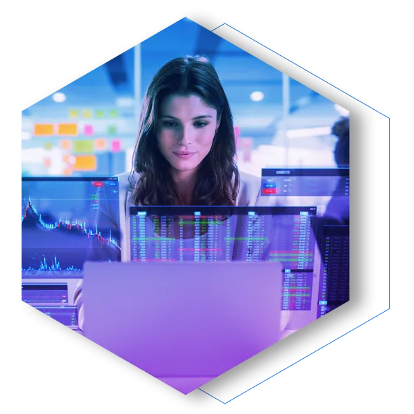 A professional woman works intently on her laptop, representing a secure user experience without friction. The image symbolizes how Menlo's proactive file sanitization disarms and rebuilds over 220 file types, preventing system compromise without interrupting the user's workflow.