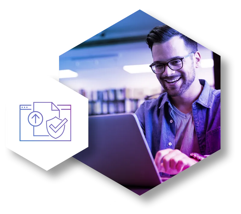 Smiling man wearing glasses working on a laptop in a modern office setting with an icon representing secure file upload on the left.