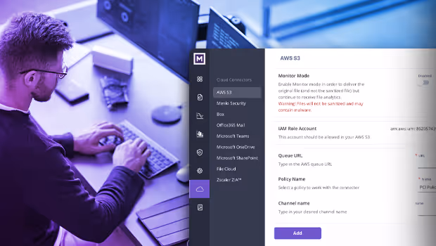 Man with glasses using a keyboard next to a computer screen displaying AWS S3 connector settings in a software interface.