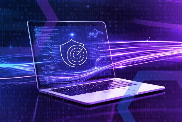 Laptop displaying a cybersecurity shield icon with radar and digital data streams in purple and blue tones.