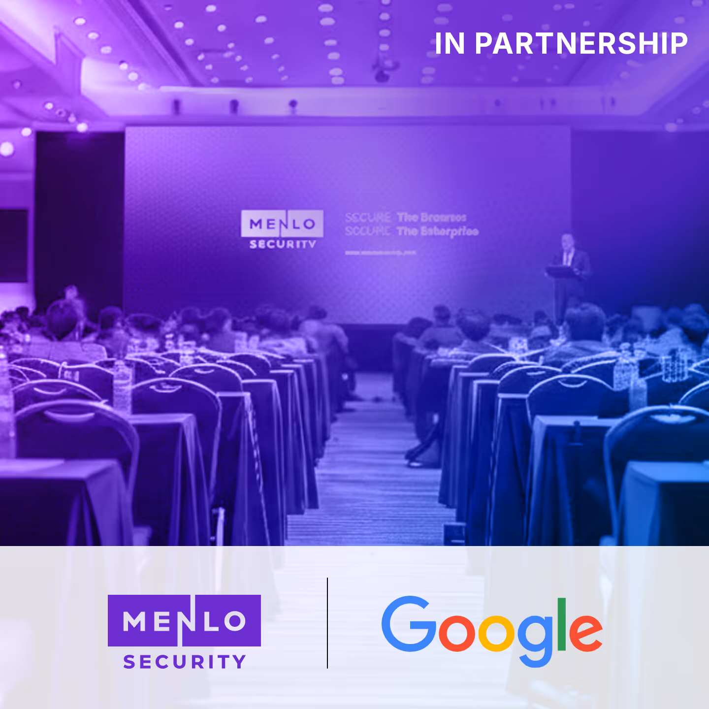 Conference room with attendees facing a speaker on stage and a screen showing Menlo Security branding, partnered with Google.