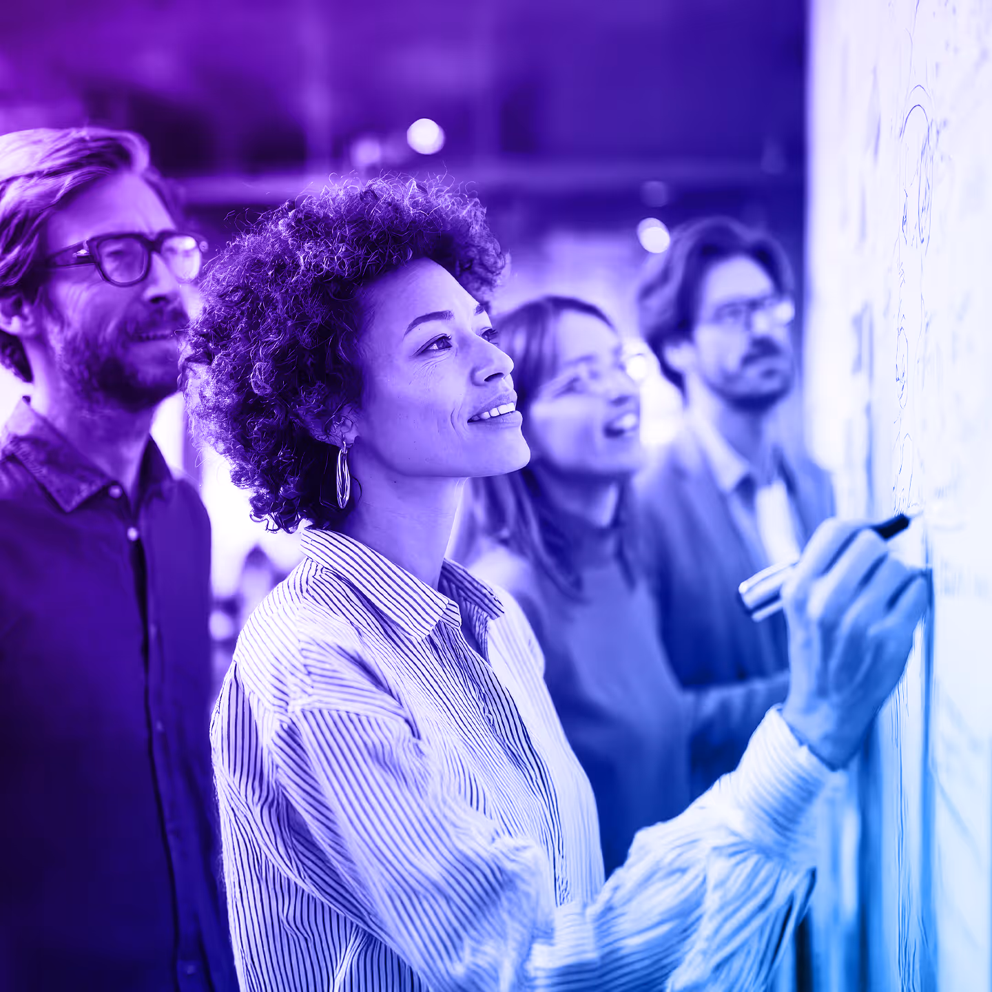 A group of diverse professionals writing on a whiteboard, with text 'Open Security Clinics' and Menlo Security logo.