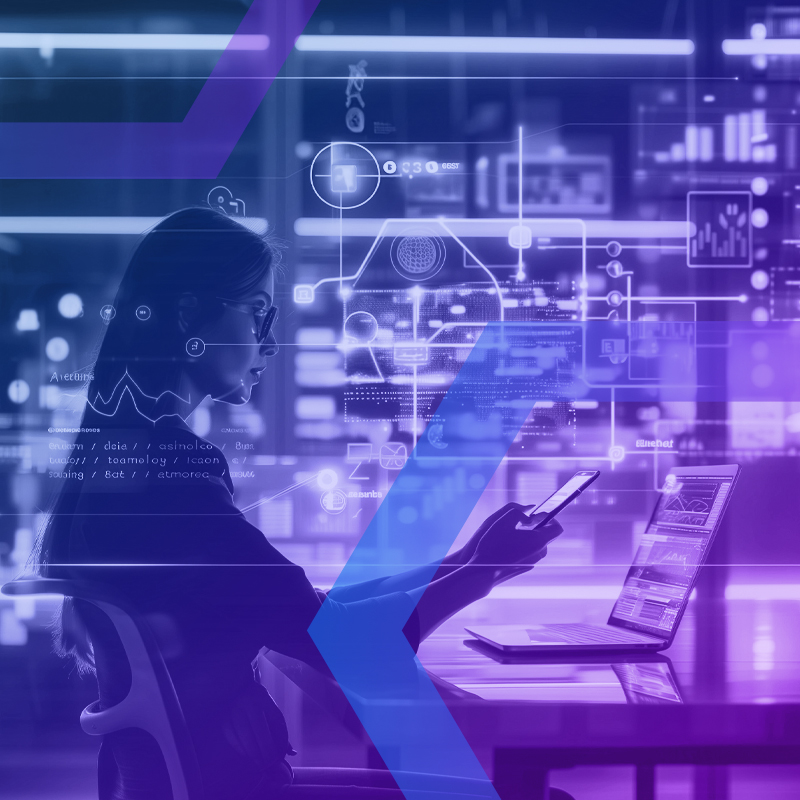 Woman using smartphone and laptop with digital data and network graphics overlay in futuristic workspace.