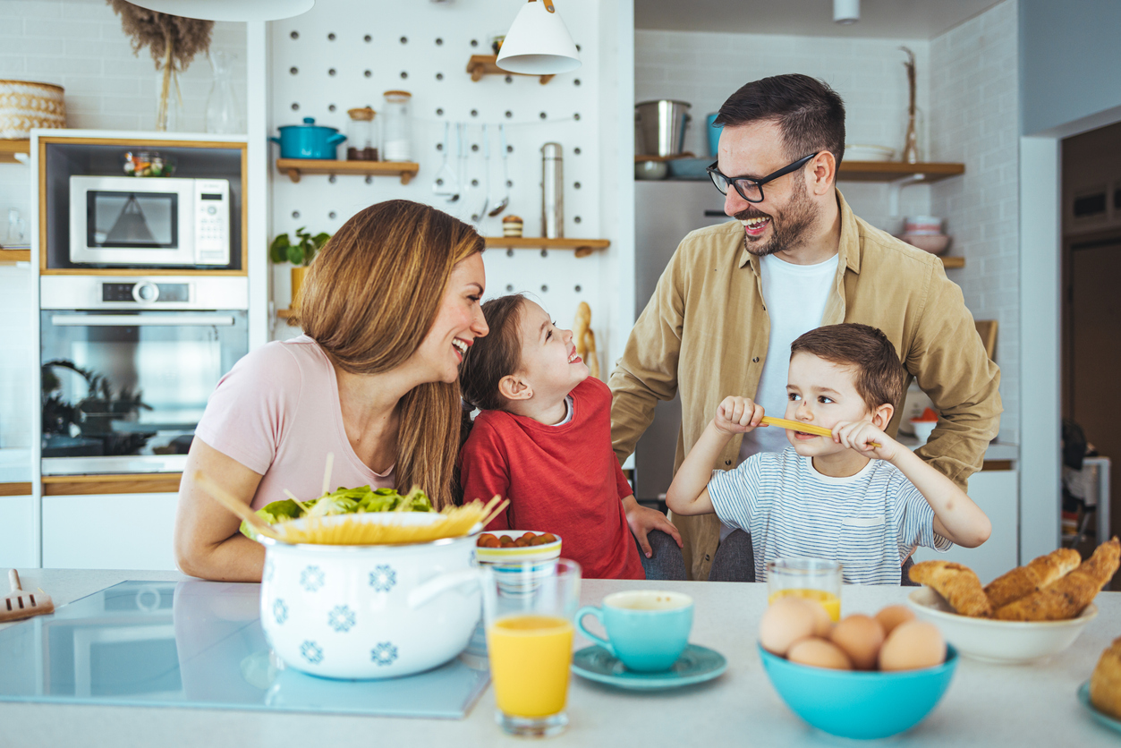 family around table talking about personal insurance needs