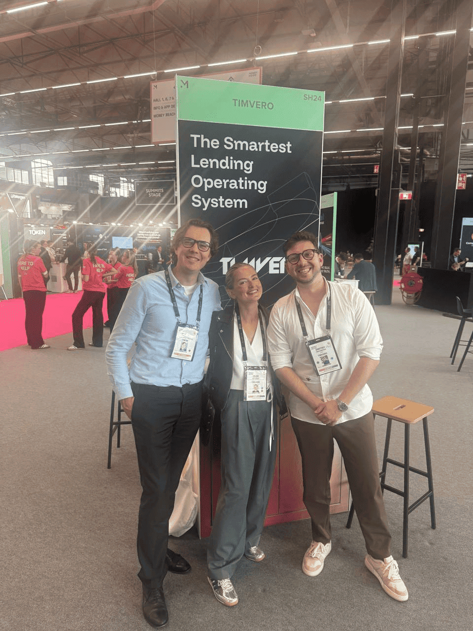 CEO Dmitriy Wolkenstein, Head of Business Development Olga Archibald with Partners on Money 2020 in Amsterdam