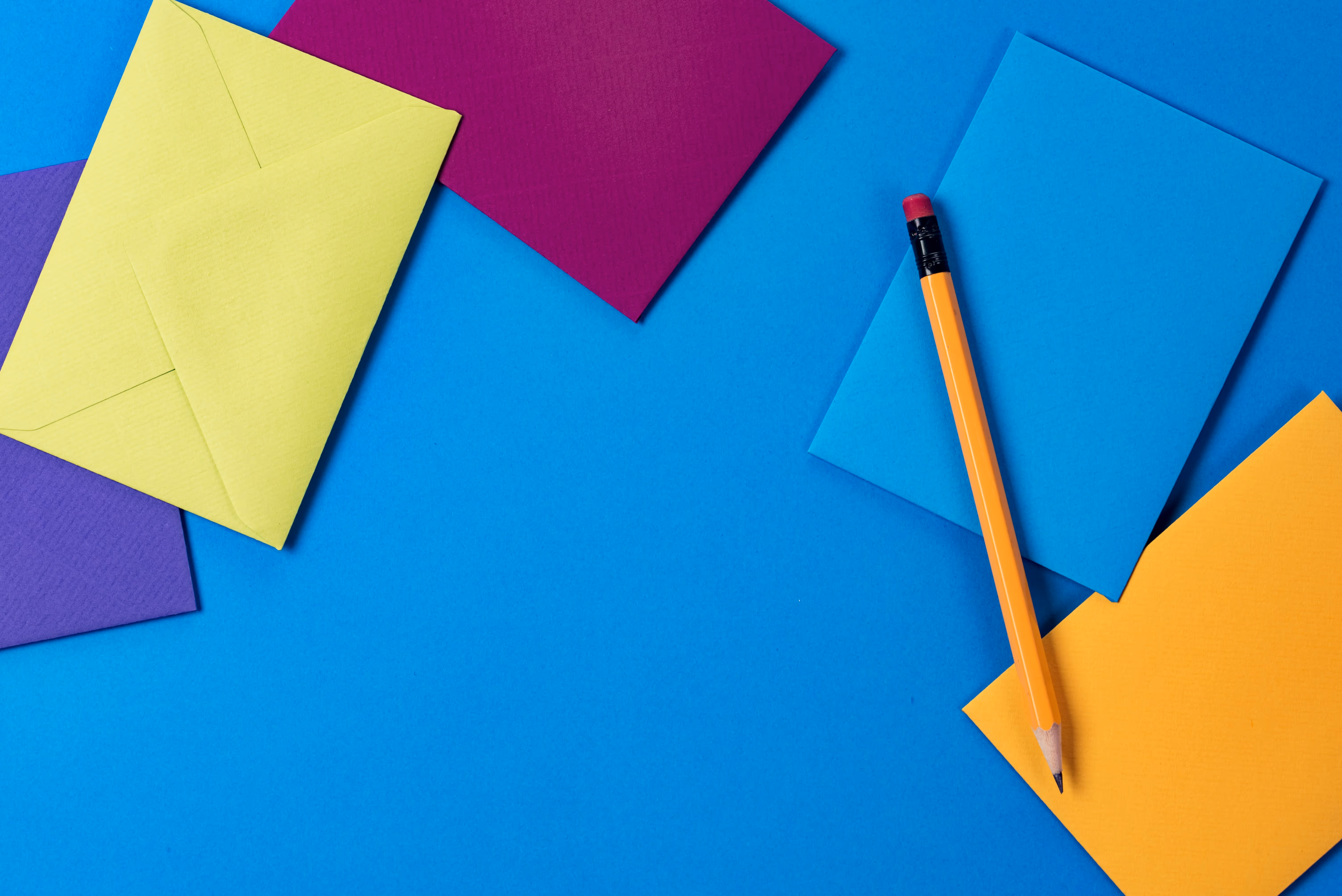 Example of color contrast - colored envelopes on a blue background