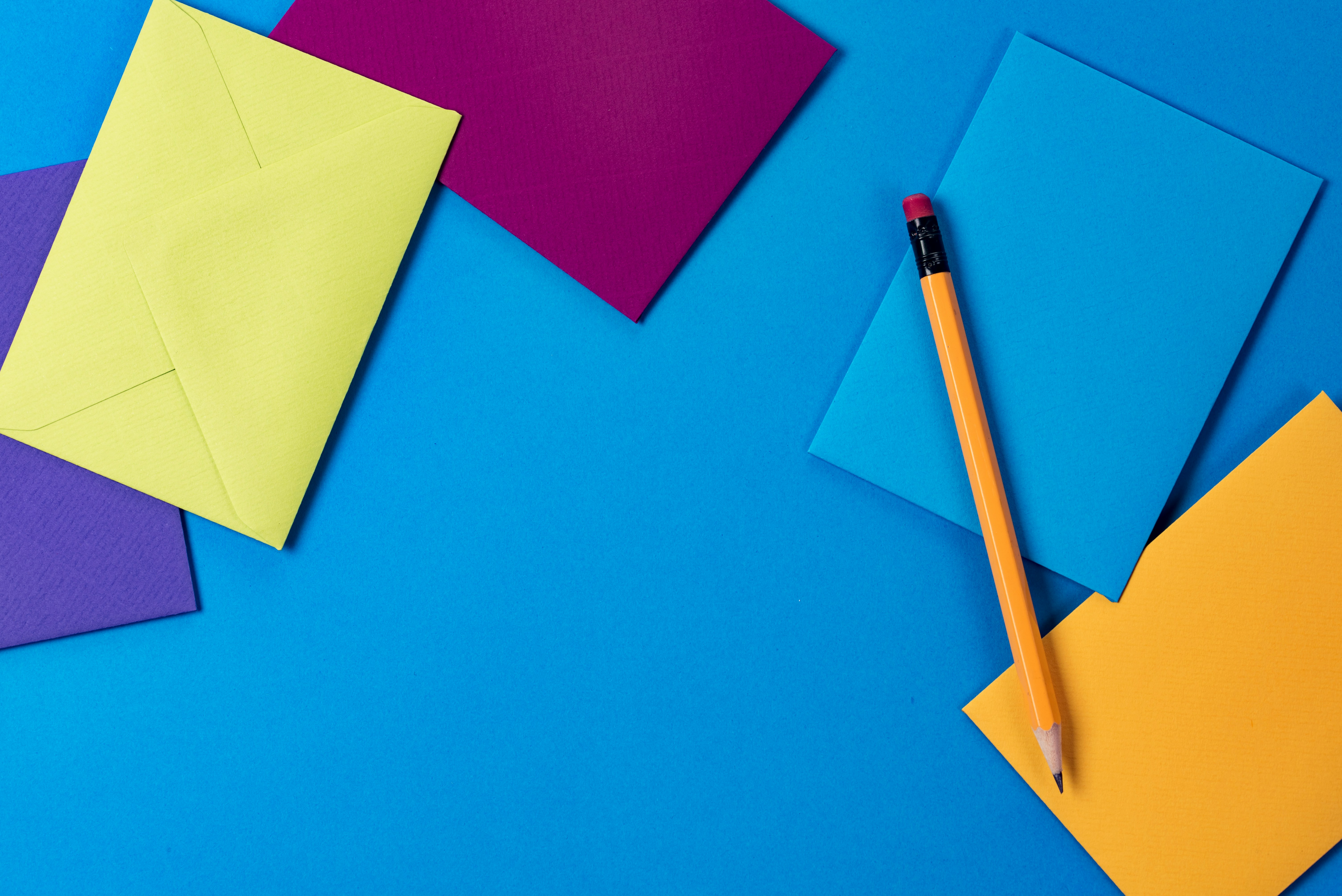 Example of color contrast - colored envelopes on a blue background