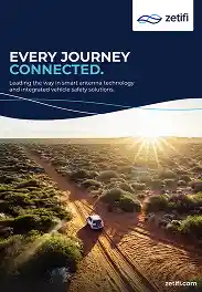 A car driving on a dirt road through a sunlit, green forest landscape with long shadows, under the text 'Every journey connected' and the Zetifi logo.