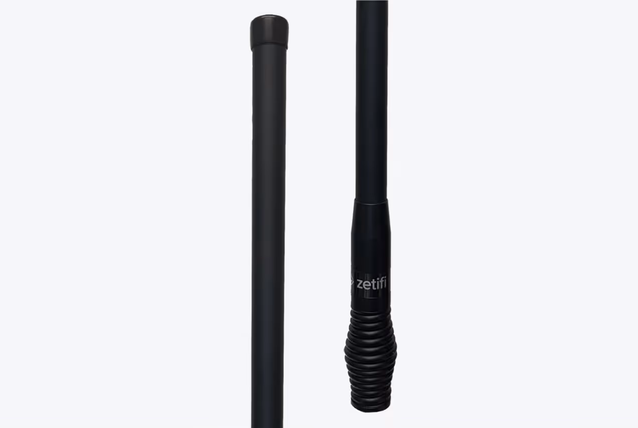 Two black Zetifi wireless communication antennas on a light gray background.