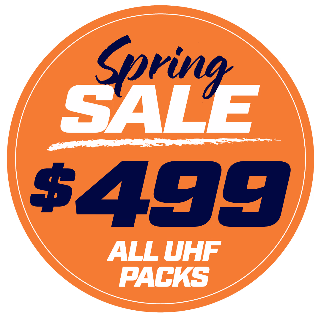 Orange circular label with text: Spring SALE $499 ALL UHF PACKS in bold white and dark blue font.