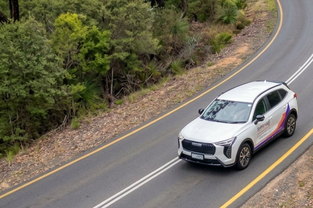 Sureway vehicle driving on a winding road