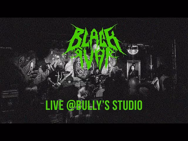 Black and white photo of a live band performing with green text overlay reading 'BLACK IVAR' and 'LIVE @BULLY'S STUDIO'.