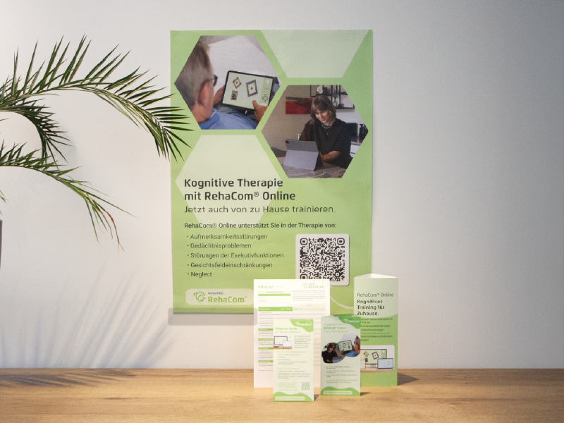 Praxiskit von RehaCom mit Poster, Flyern, Tresenaufsteller und RehaCept