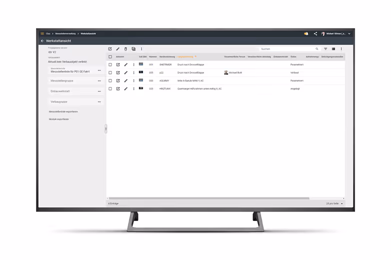Monitor displaying a German workshop view software interface with a list of measurement locations, including columns for number, description, responsible person, status, and attachment icons.