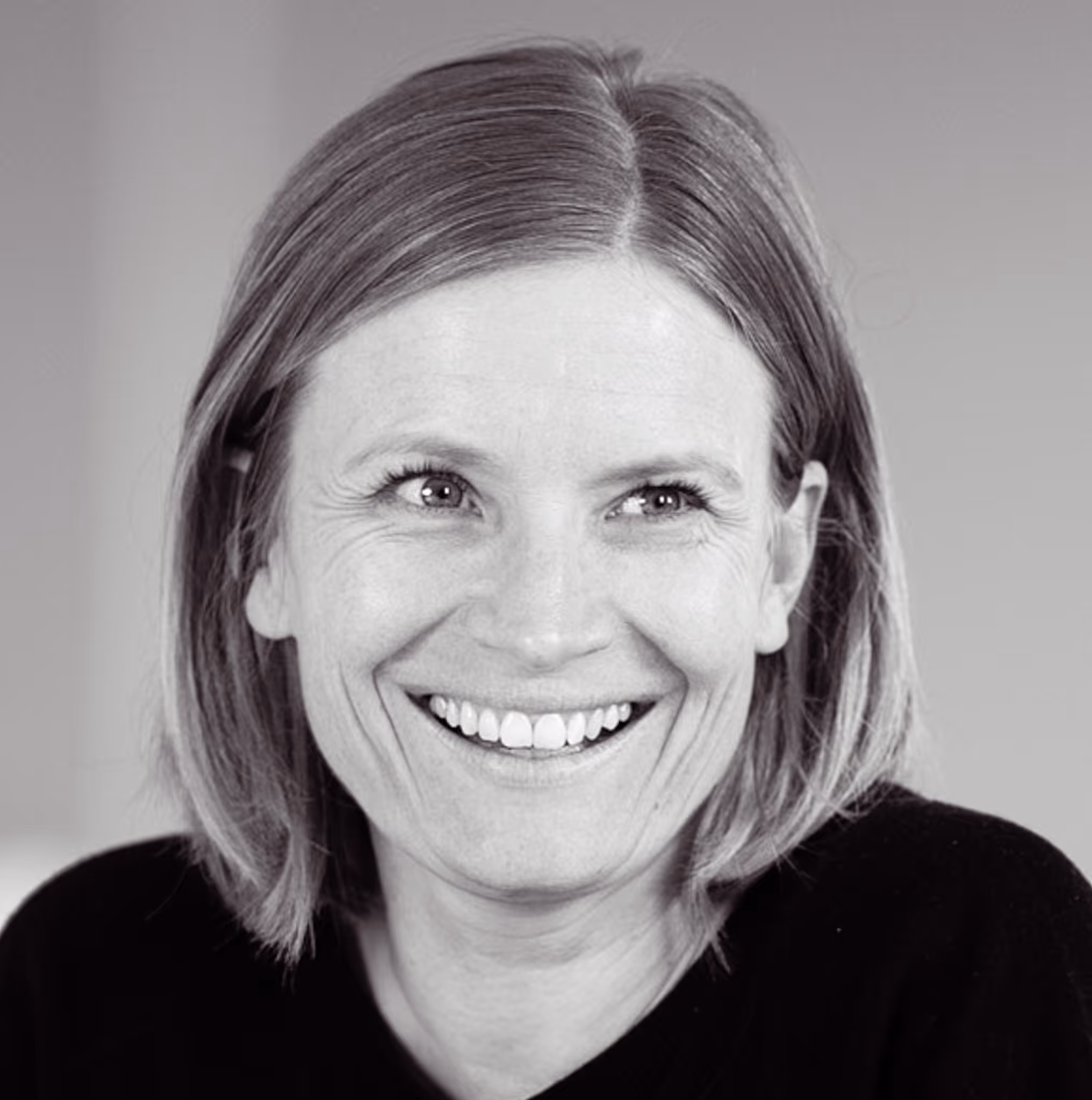 Picture of a smiling woman.
