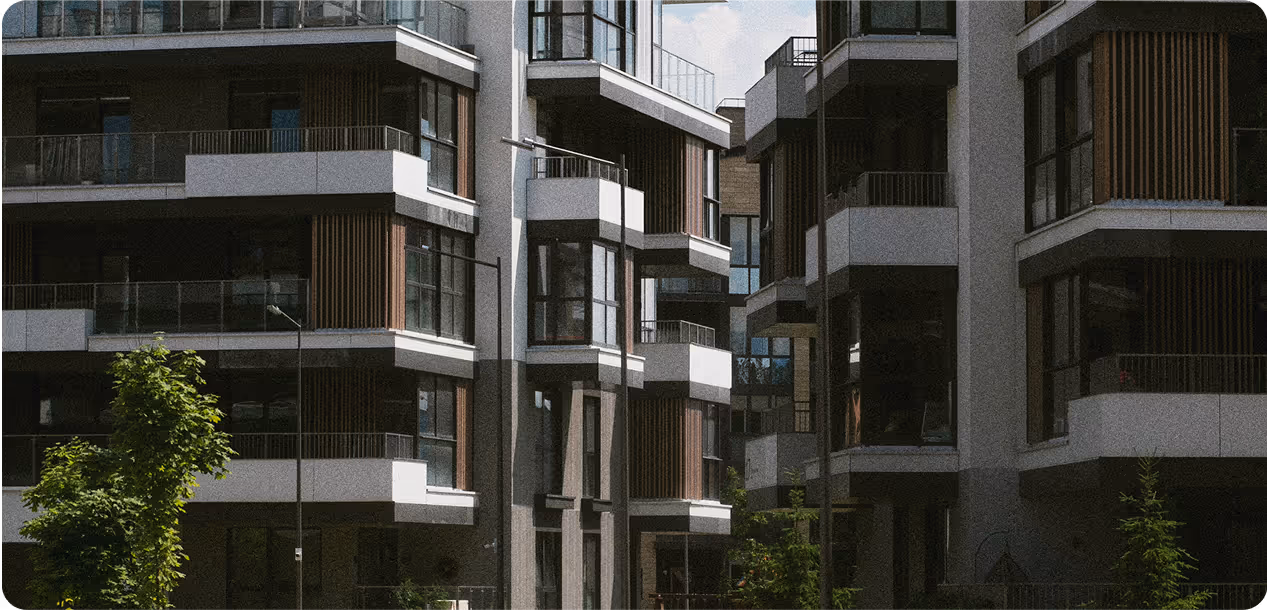 A bunch of minimalist and elegant buildings with some trees showing