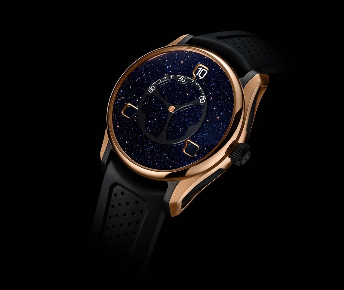 An aventurine dial gives the watch a starry effect. The case is 5N red gold.