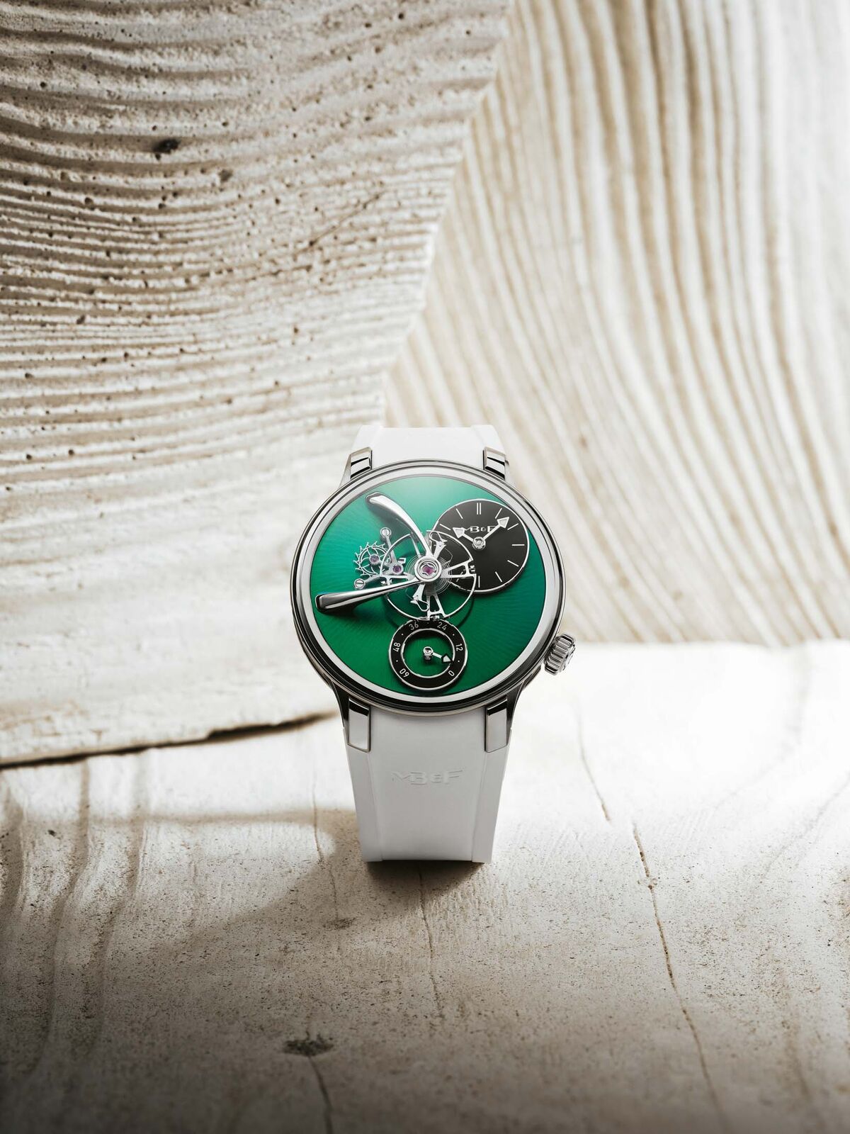 The MB&F LM101 EVO comes with either a green or salmon dial.