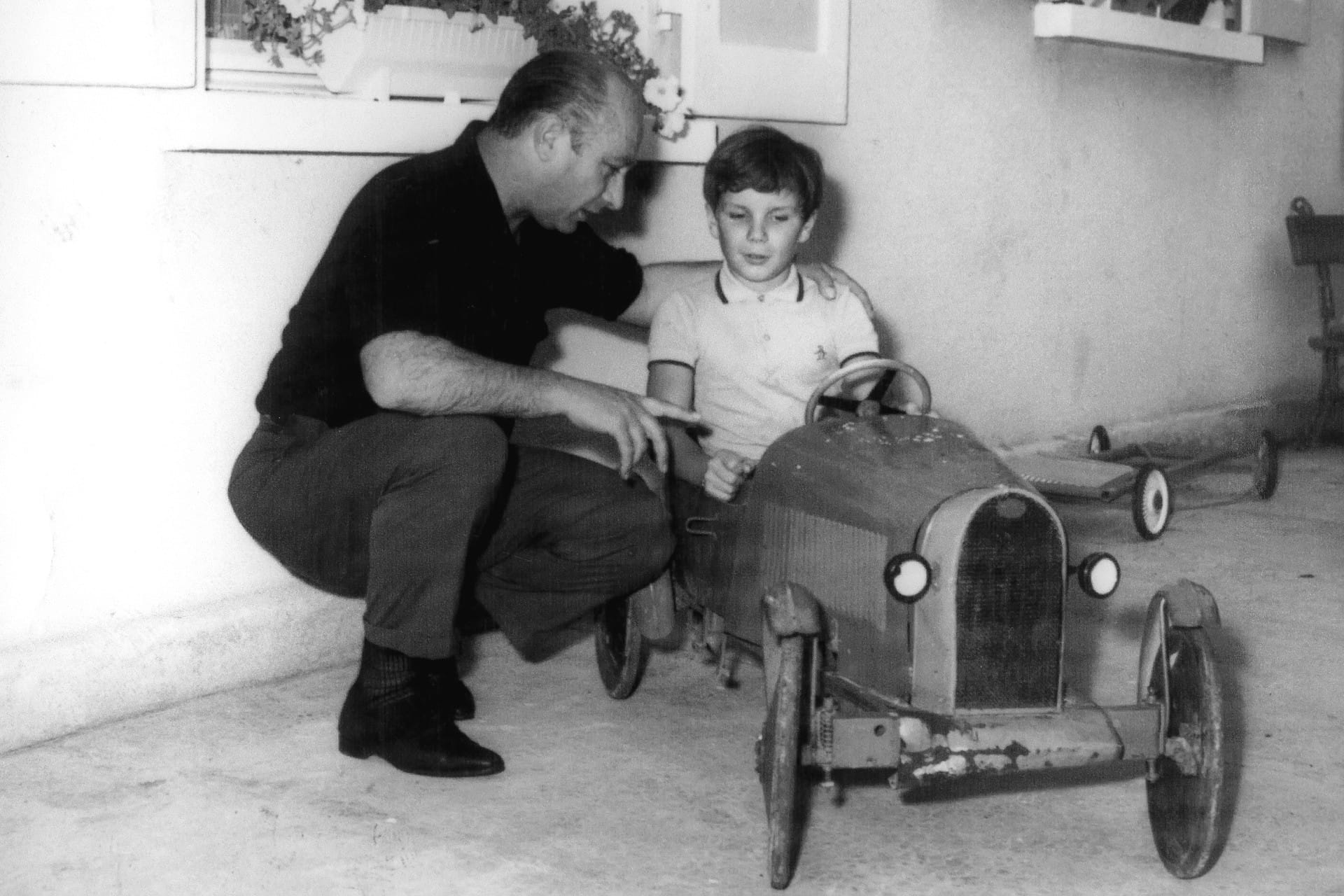 Juan Manuel Fangio donnant des conseils à Paul-Henri en 1961