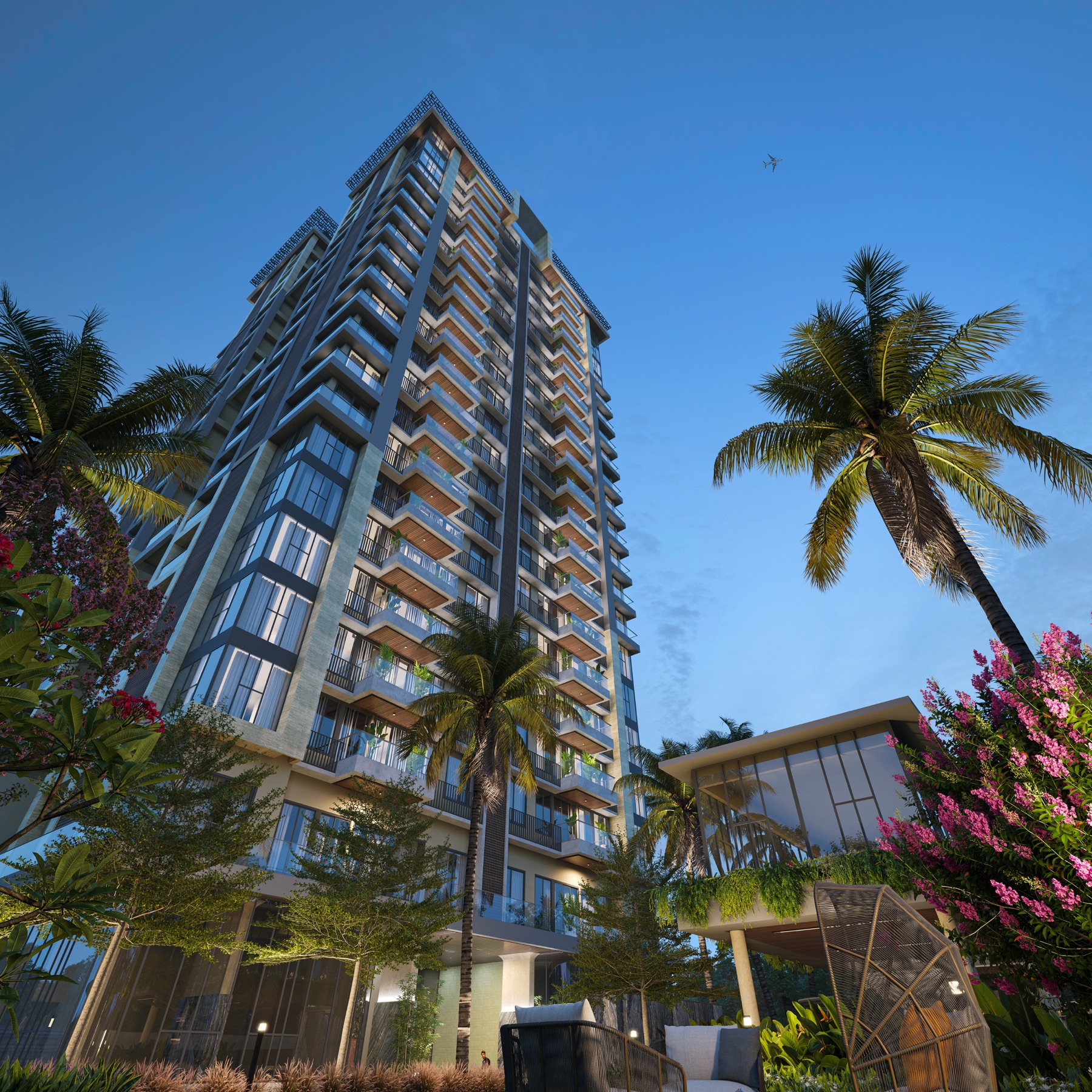 Residential tower framed by palm trees
