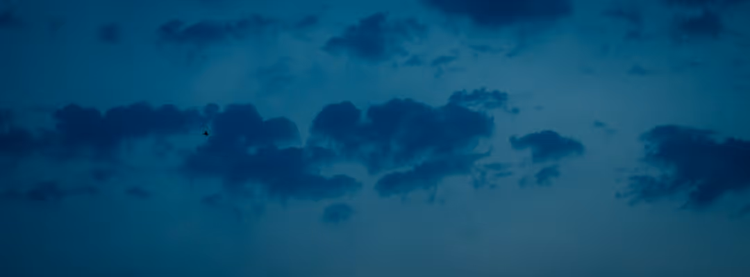 Dark blue clouds fill the sky.