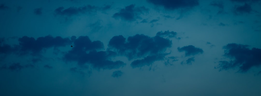 Dark blue clouds fill the sky.