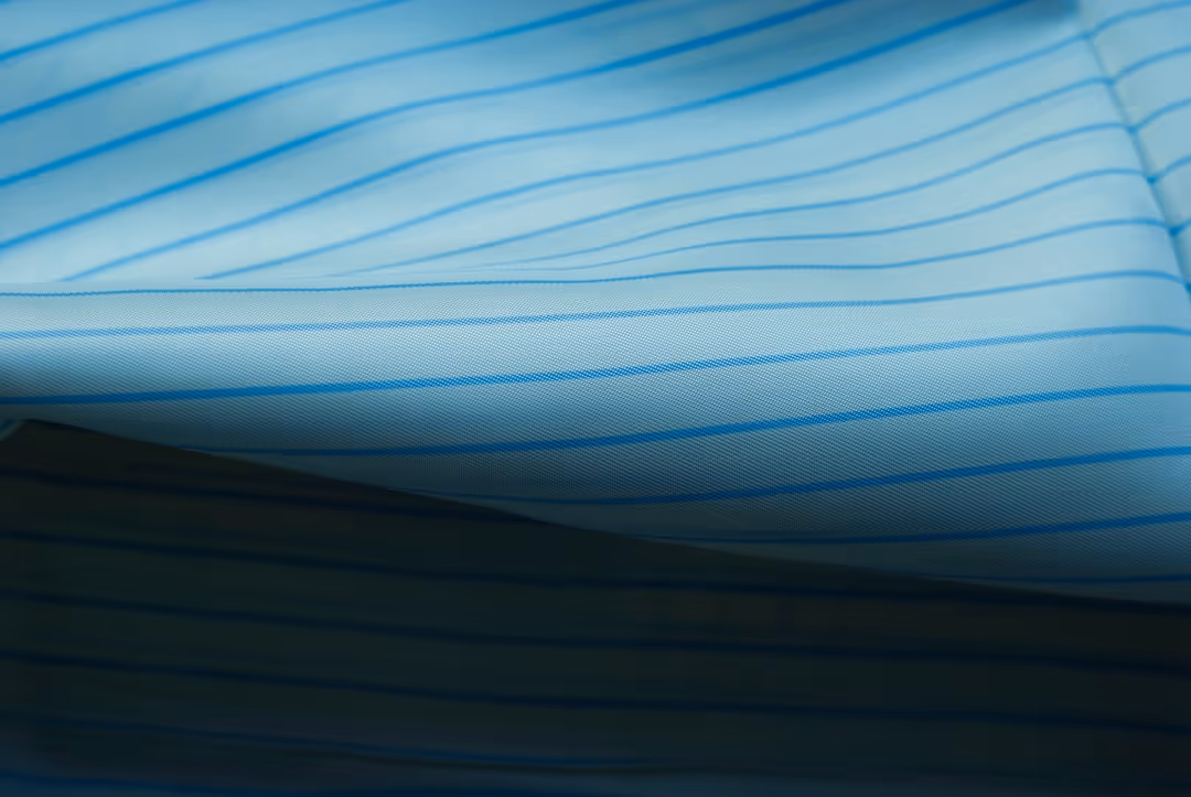 Blue striped fabric is folded over itself.