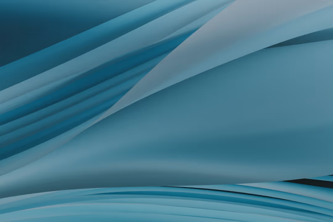 an abstract photo of blue and white waves