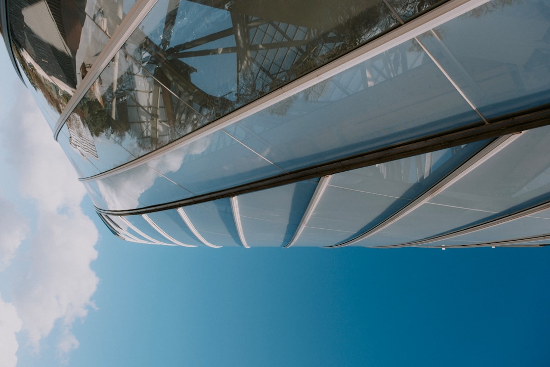 looking up at the side of a tall building