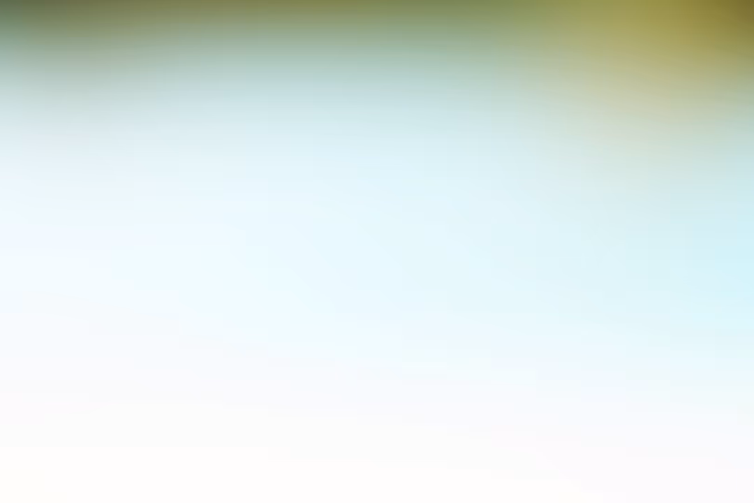a blurry image of a green and yellow background