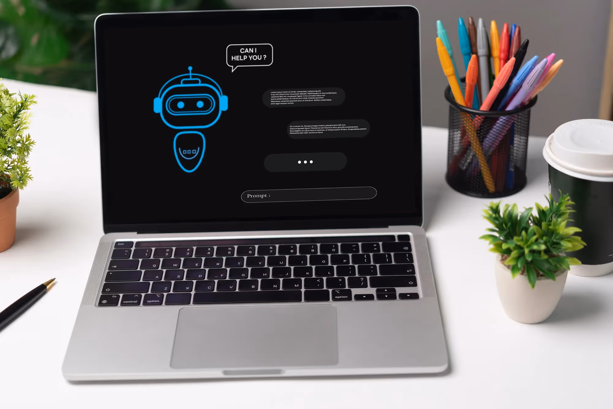 A laptop with a robot on the screen.